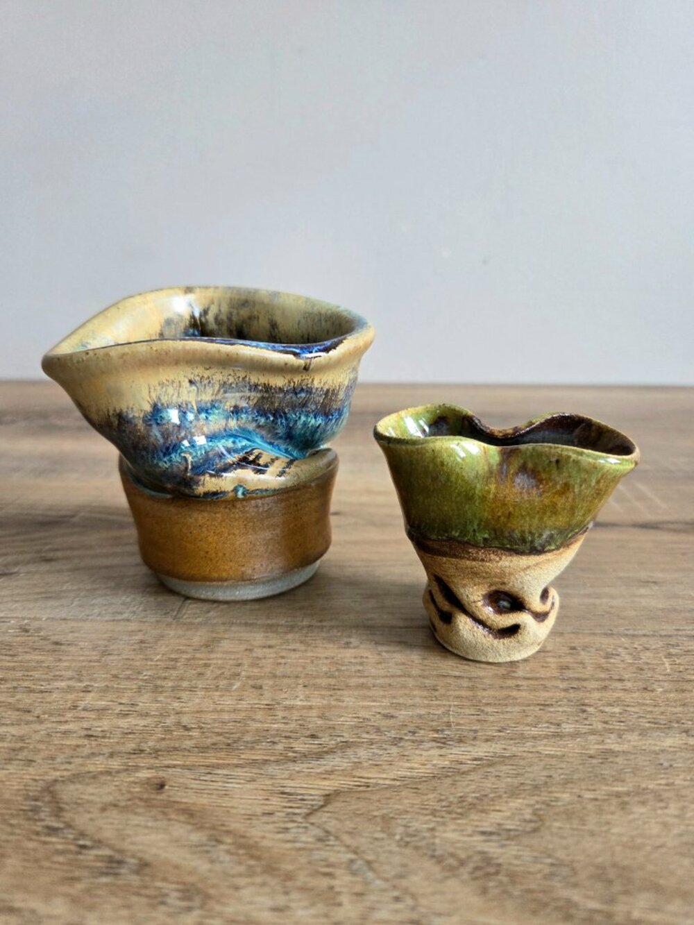 2 handmade organic shape ceramic vases signed by artist.